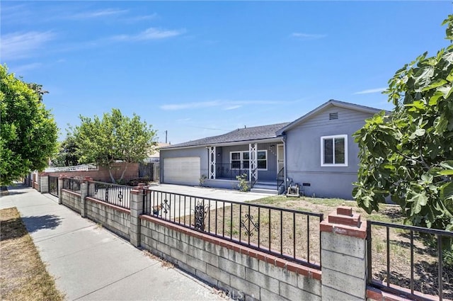 4449 Walnut St, Baldwin Park, CA 91706 - ranch-style home featuring an attached garage, a fenced front yard, stucco siding, and driveway