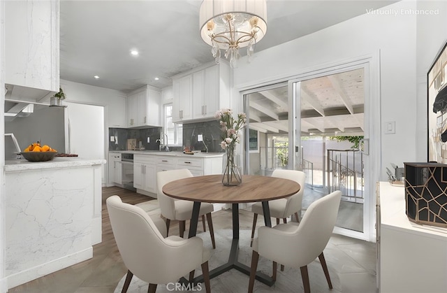 4449 Walnut St, Baldwin Park, CA 91706 - dining space featuring healthy amount of natural light, recessed lighting, and a chandelier