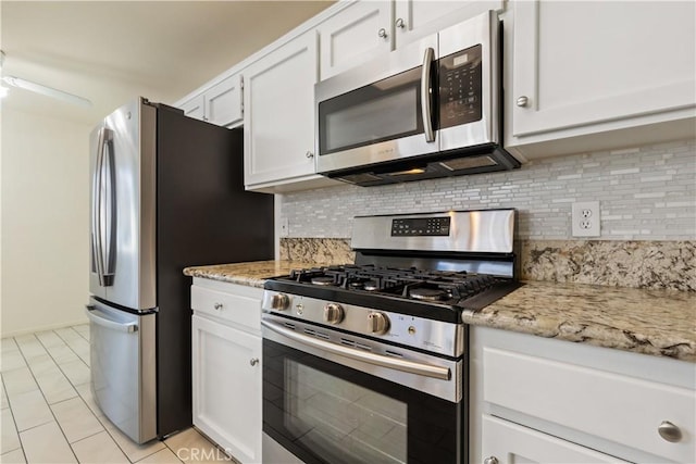 1158 Pacific Pointe Way, Arroyo Grande, CA 93420 - kitchen featuring appliances with stainless steel finishes, tasteful backsplash, white cabinets, and light stone countertops