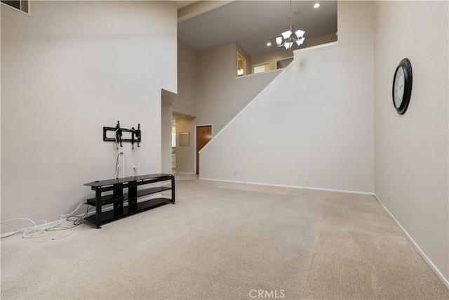 1158 Pacific Pointe Way, Arroyo Grande, CA 93420 - unfurnished living room featuring carpet floors, a chandelier, high vaulted ceiling, and stairs