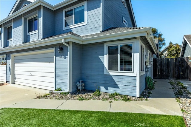 1158 Pacific Pointe Way, Arroyo Grande, CA 93420 - view of home's exterior with a garage, concrete driveway, and a shingled roof