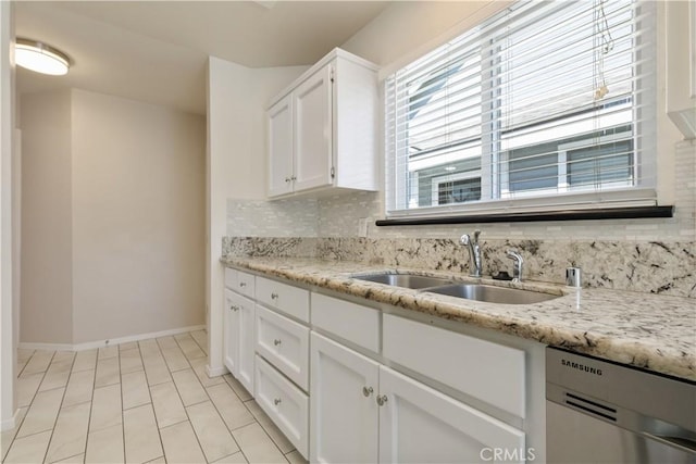 1158 Pacific Pointe Way, Arroyo Grande, CA 93420 - kitchen featuring stainless steel dishwasher, decorative backsplash, white cabinetry, light stone counters, and light tile patterned flooring