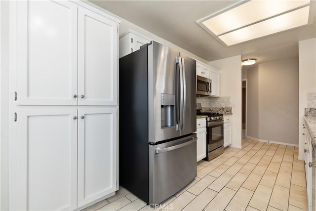 1158 Pacific Pointe Way, Arroyo Grande, CA 93420 - kitchen featuring stainless steel appliances, decorative backsplash, white cabinets, and light stone counters