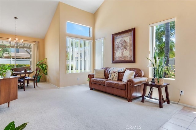 20776 Freeport Dr, Riverside, CA 92508 - carpeted living area with a chandelier, plenty of natural light, a towering ceiling, and tile patterned floors