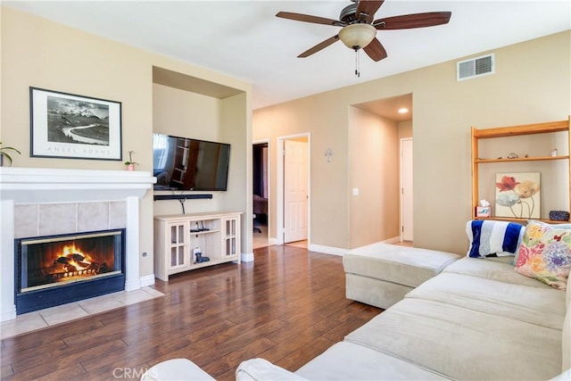 20776 Freeport Dr, Riverside, CA 92508 - living area with wood-type flooring, ceiling fan, and a tiled fireplace