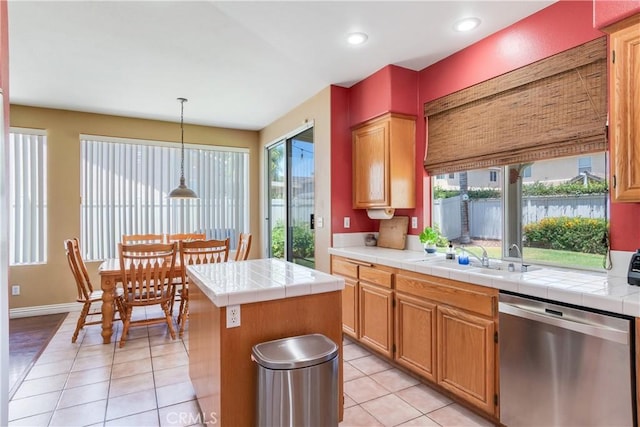 20776 Freeport Dr, Riverside, CA 92508 - kitchen with dishwasher, light tile patterned floors, tile countertops, hanging light fixtures, and recessed lighting
