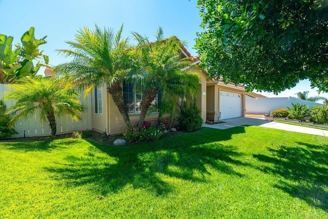 426 Debra An Dr, Fallbrook, CA 92028 - view of front of home featuring a garage, driveway, and stucco siding