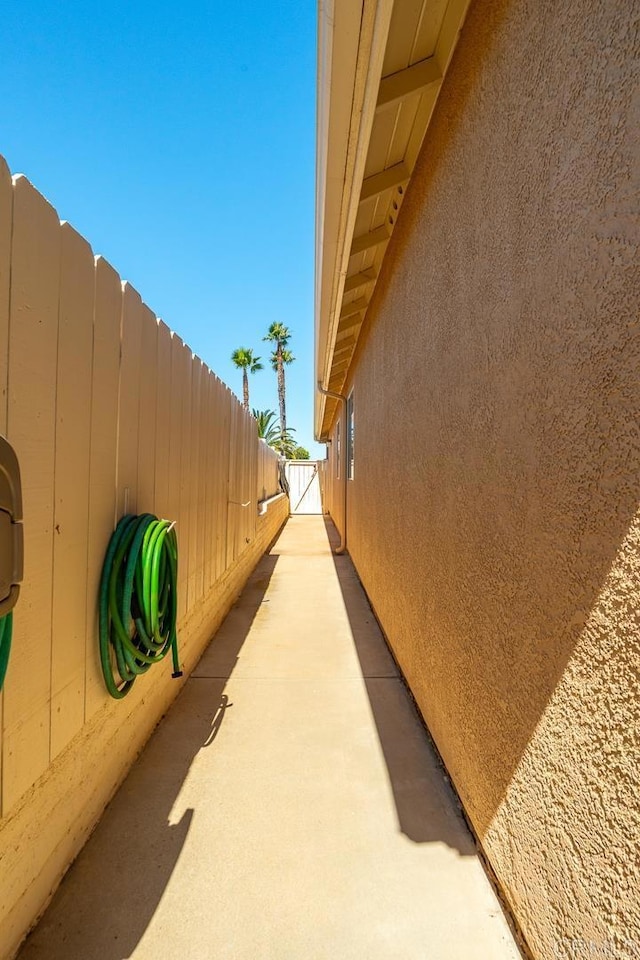 426 Debra An Dr, Fallbrook, CA 92028 - view of home's exterior with stucco siding and a gate
