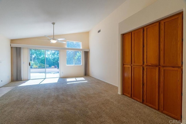 426 Debra An Dr, Fallbrook, CA 92028 - unfurnished room with vaulted ceiling, light carpet, and ceiling fan