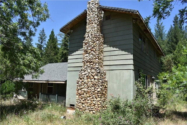 11605 La Porte Rd, Challenge, CA 95925 - view of home's exterior with a chimney and roof with shingles