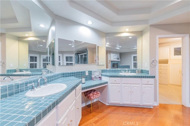 27860 Mount Shasta Way, Yorba Linda, CA 92887 - bathroom with wood finished floors, vanity, recessed lighting, and decorative backsplash