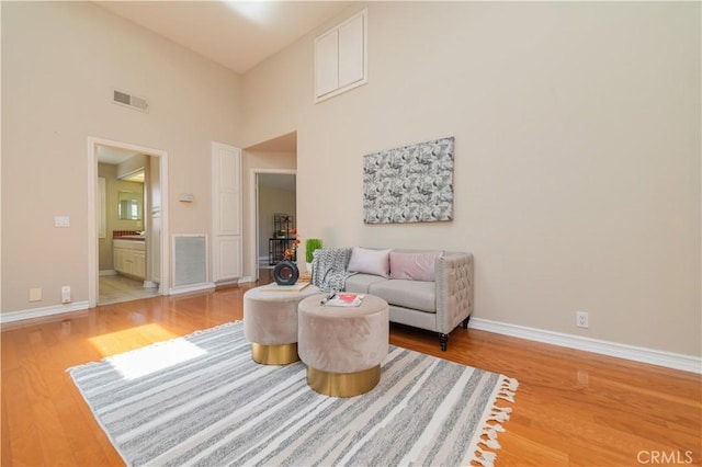 27860 Mount Shasta Way, Yorba Linda, CA 92887 - living room featuring light wood-type flooring and a towering ceiling