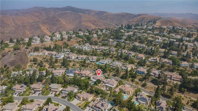27860 Mount Shasta Way, Yorba Linda, CA 92887 - aerial view of property and surrounding area featuring a mountainous background and nearby suburban area