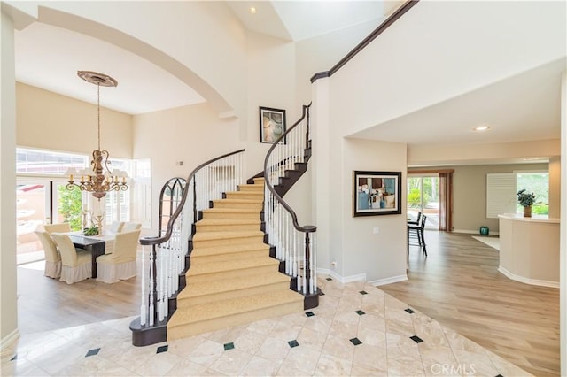 27860 Mount Shasta Way, Yorba Linda, CA 92887 - tiled foyer entrance featuring a high ceiling, stairway, a chandelier, arched walkways, and recessed lighting