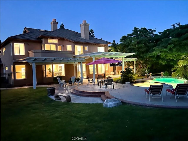 27860 Mount Shasta Way, Yorba Linda, CA 92887 - rear view of property with a pergola, stucco siding, a lawn, and an outdoor pool