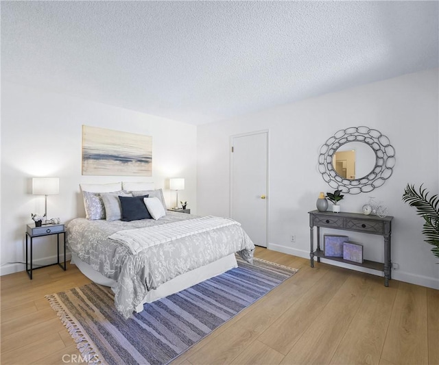 3610 Vista Glen Cir, Yorba Linda, CA 92886 - bedroom featuring light wood-style floors and a textured ceiling