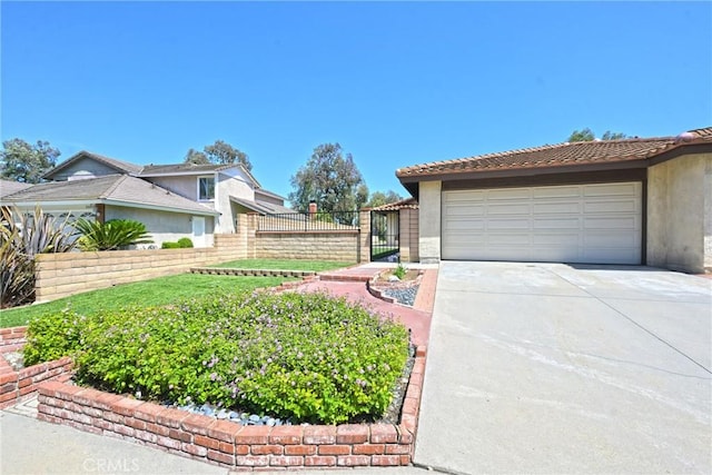 3610 Vista Glen Cir, Yorba Linda, CA 92886 - view of property exterior with a garage, driveway, and stucco siding