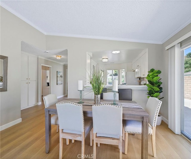 3610 Vista Glen Cir, Yorba Linda, CA 92886 - dining room with ornamental molding, light wood-type flooring, and a textured ceiling