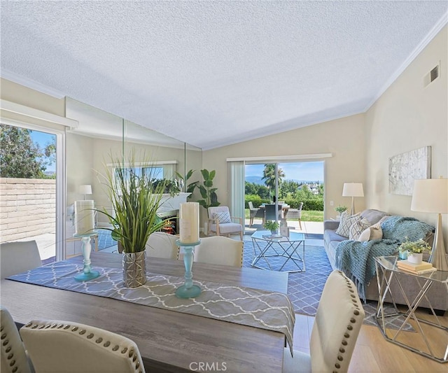 3610 Vista Glen Cir, Yorba Linda, CA 92886 - living area with vaulted ceiling, wood finished floors, a textured ceiling, crown molding, and plenty of natural light
