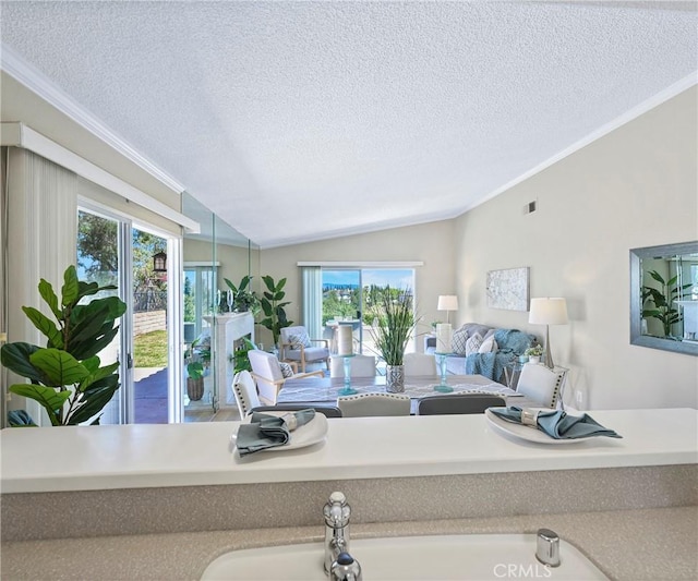 3610 Vista Glen Cir, Yorba Linda, CA 92886 - living room with ornamental molding, a textured ceiling, vaulted ceiling, and healthy amount of natural light