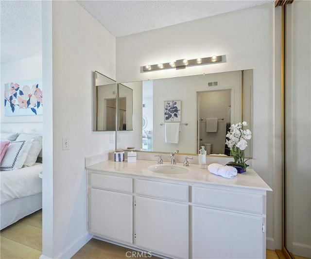 3610 Vista Glen Cir, Yorba Linda, CA 92886 - ensuite bathroom with vanity and a textured ceiling