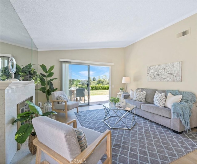 3610 Vista Glen Cir, Yorba Linda, CA 92886 - living area with a textured ceiling, crown molding, a premium fireplace, and vaulted ceiling