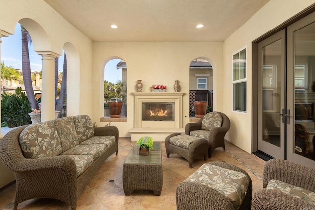 6767 Malachite Pl, Carlsbad, CA 92009 - view of patio / terrace with an outdoor living space with a fireplace and french doors