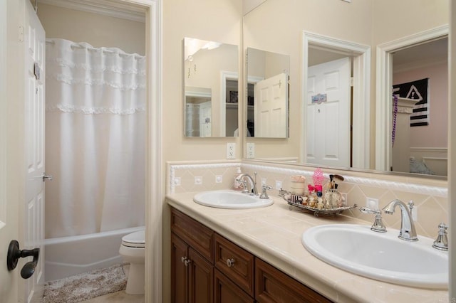 6767 Malachite Pl, Carlsbad, CA 92009 - full bath with double vanity, shower / bath combo with shower curtain, decorative backsplash, and ornamental molding