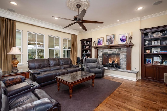 6767 Malachite Pl, Carlsbad, CA 92009 - living area featuring a ceiling fan, a fireplace, ornamental molding, wood finished floors, and recessed lighting