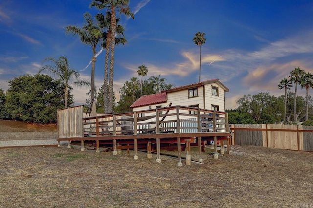 929 Chumash Trl, Vista, CA 92084 - back of property at dusk featuring a wooden deck