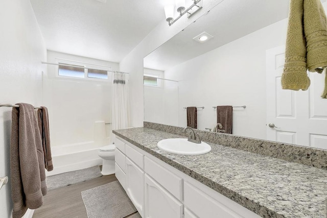 929 Chumash Trl, Vista, CA 92084 - bathroom with vanity, wood finished floors, and shower / bath combo with shower curtain