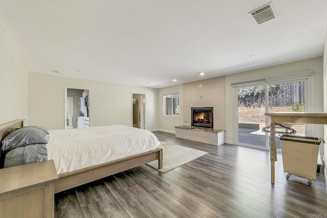 929 Chumash Trl, Vista, CA 92084 - bedroom featuring access to outside, wood finished floors, a fireplace, and recessed lighting