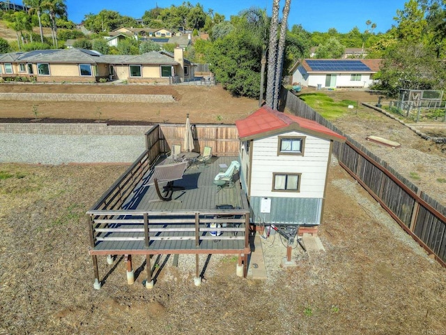 929 Chumash Trl, Vista, CA 92084 - rear view of property featuring a wooden deck, a shed, and a fenced backyard