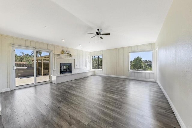 929 Chumash Trl, Vista, CA 92084 - unfurnished living room with ceiling fan, dark wood-type flooring, and a fireplace