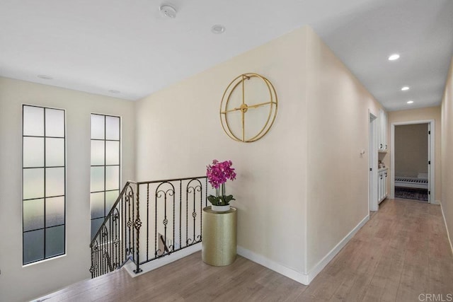 2044 Eula Ln, El Cajon, CA 92019 - hall featuring an upstairs landing, wood finished floors, recessed lighting, and baseboard heating