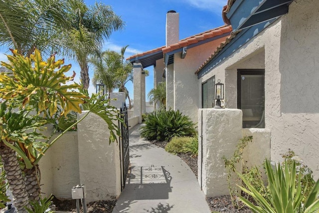 2044 Eula Ln, El Cajon, CA 92019 - view of property exterior featuring stucco siding and a tiled roof
