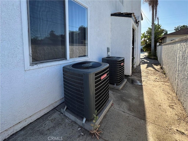 9135 Cord Ave, Downey, CA 90240 - exterior view of a central air condition unit and stucco siding