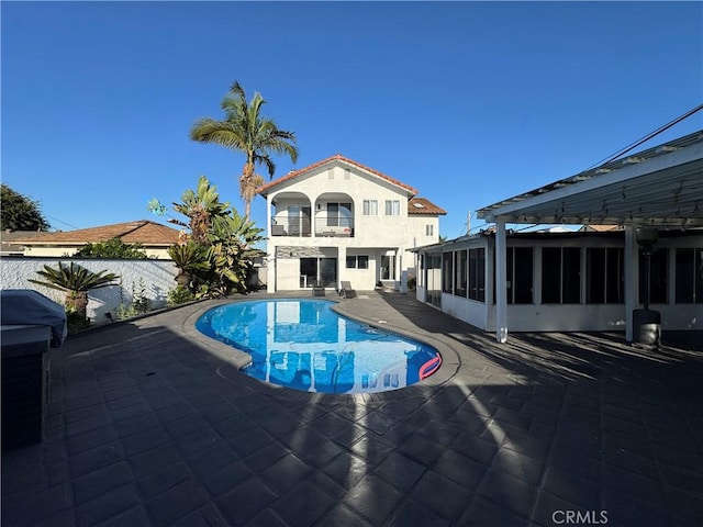 9135 Cord Ave, Downey, CA 90240 - view of swimming pool featuring a patio area and a sunroom