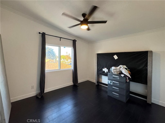 9135 Cord Ave, Downey, CA 90240 - empty room with vaulted ceiling, ceiling fan, dark wood finished floors, and crown molding