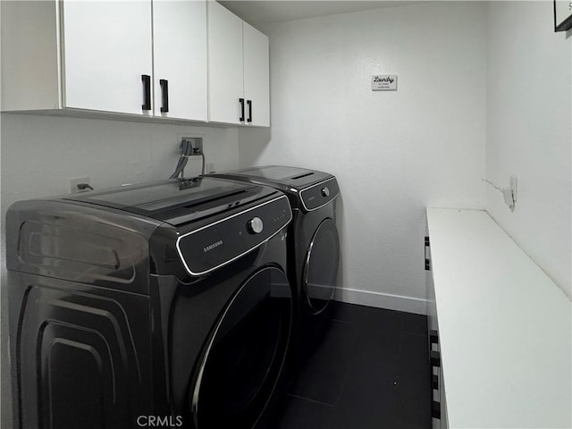 9135 Cord Ave, Downey, CA 90240 - laundry area featuring cabinet space and washer and clothes dryer