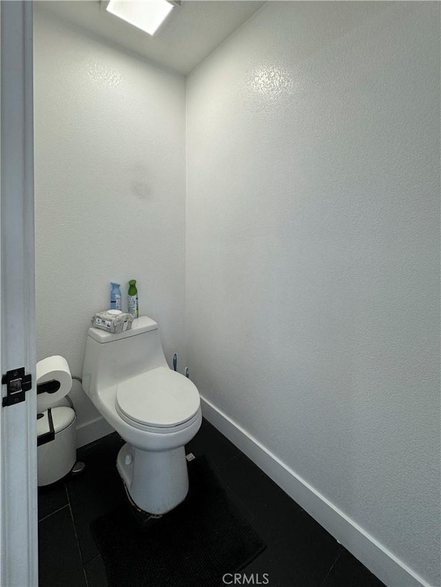 9135 Cord Ave, Downey, CA 90240 - bathroom featuring toilet and tile patterned flooring