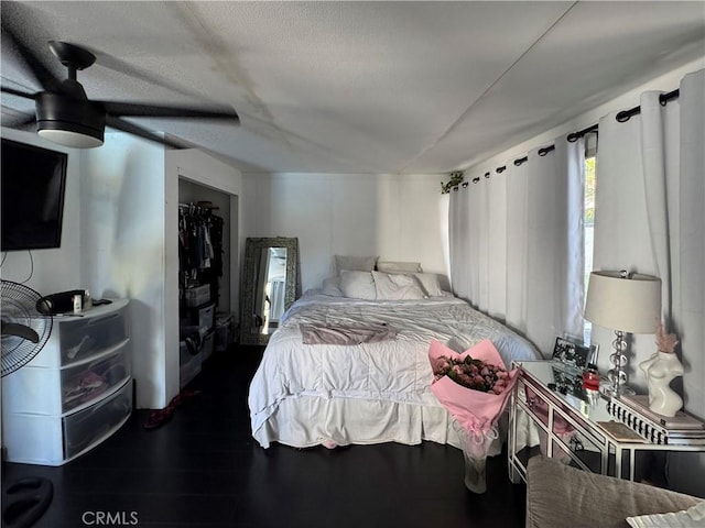 9135 Cord Ave, Downey, CA 90240 - bedroom with a ceiling fan, wood finished floors, and a textured ceiling