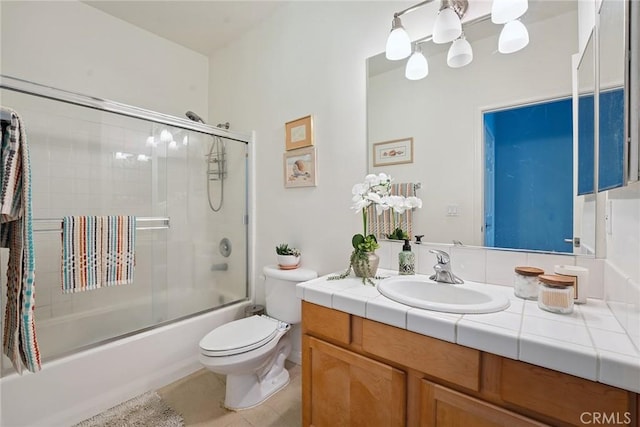 9610 Zelzah Ave Unit 105, Northridge, CA 91325 - bathroom featuring vanity, combined bath / shower with glass door, and tile patterned floors