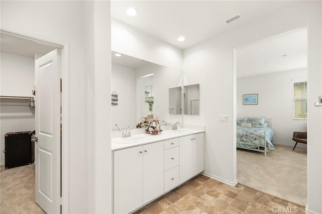 31268 Via Nubes, Temecula, CA 92592 - full bath with double vanity, ensuite bathroom, and recessed lighting