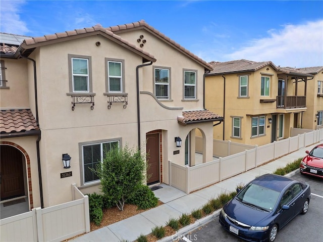 31268 Via Nubes, Temecula, CA 92592 - mediterranean / spanish home featuring a tiled roof and stucco siding