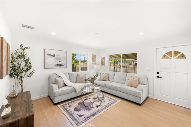 8252 Graves Ave, Rosemead, CA 91770 - living area featuring light wood-style floors and recessed lighting