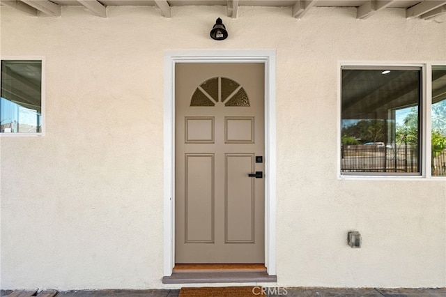 8252 Graves Ave, Rosemead, CA 91770 - doorway to property featuring stucco siding