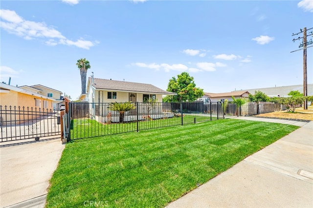8252 Graves Ave, Rosemead, CA 91770 - view of front facade with a fenced front yard, stucco siding, a gate, and a residential view