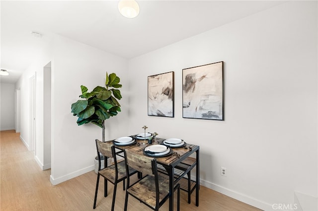 8252 Graves Ave, Rosemead, CA 91770 - dining room featuring light wood-style floors and baseboards