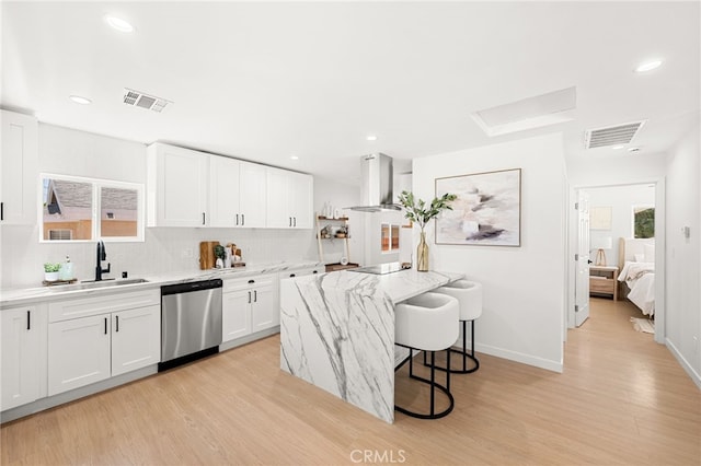 8252 Graves Ave, Rosemead, CA 91770 - kitchen with stainless steel dishwasher, wall chimney range hood, light wood-type flooring, backsplash, and white cabinetry